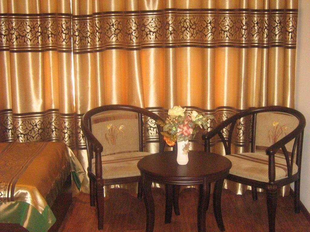 Kausar Hotel Almaty Værelse billede
