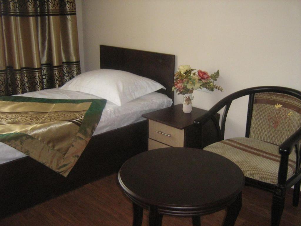 Kausar Hotel Almaty Værelse billede