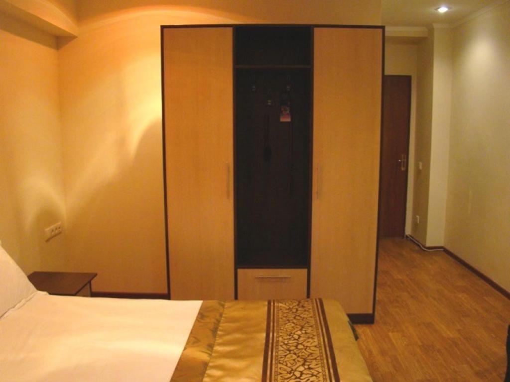 Kausar Hotel Almaty Værelse billede