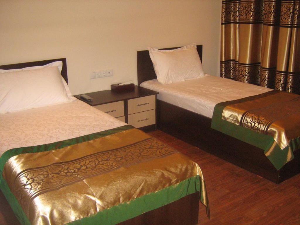 Kausar Hotel Almaty Værelse billede