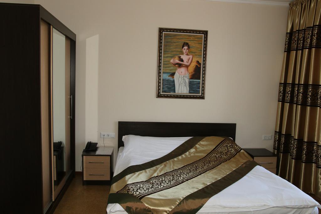 Kausar Hotel Almaty Værelse billede