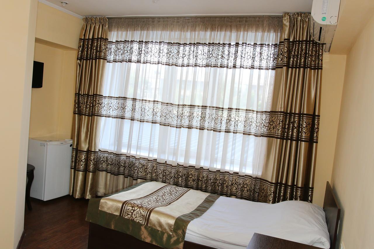 Kausar Hotel Almaty Værelse billede