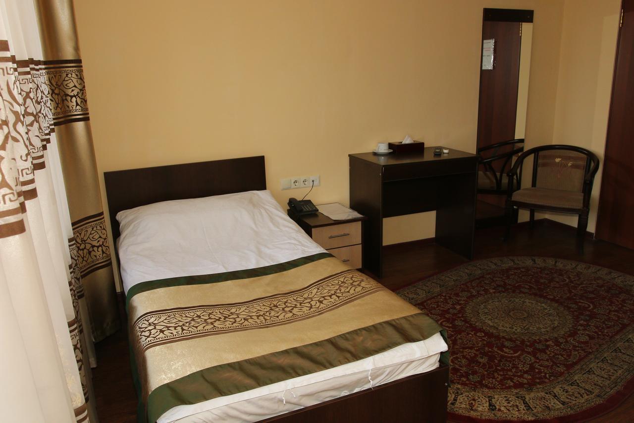Kausar Hotel Almaty Værelse billede